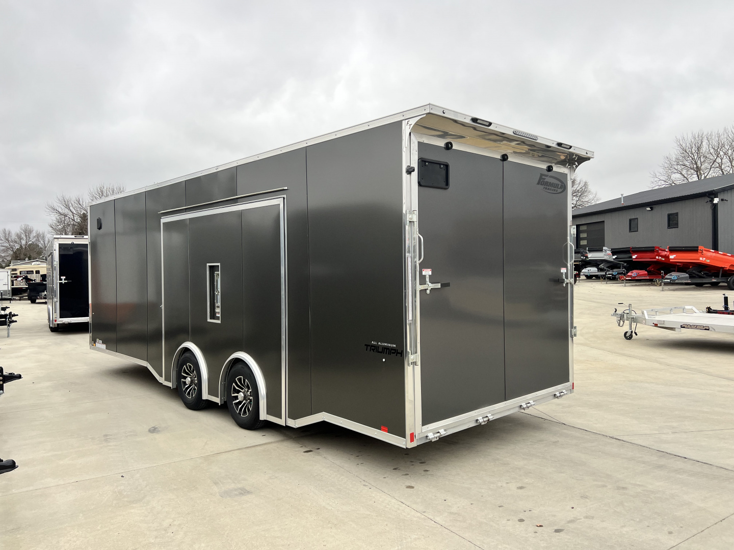 New NEW 2026 Formula Triumph ALUMINUM 8.5x24 +V, 7’ TALL, WHITE Interior, QUALITY Enclosed Rear Ramp Car Hauler Cargo Trailer