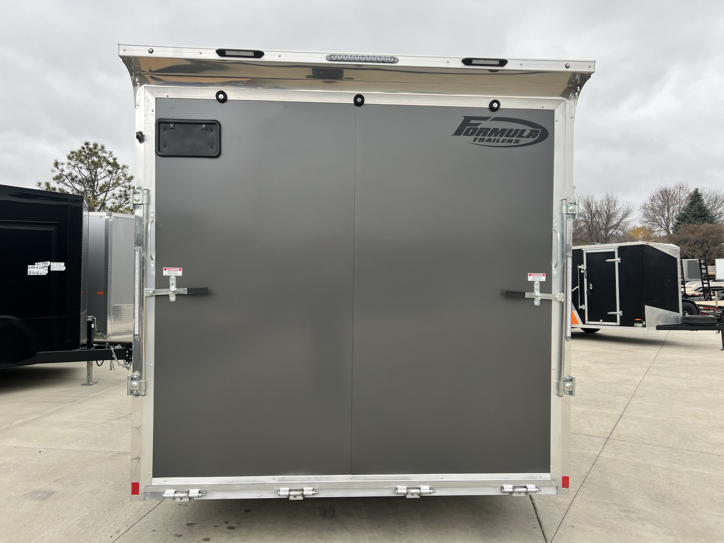 New NEW 2026 Formula Triumph ALUMINUM 8.5x24 +V, 7’ TALL, WHITE Interior, QUALITY Enclosed Rear Ramp Car Hauler Cargo Trailer