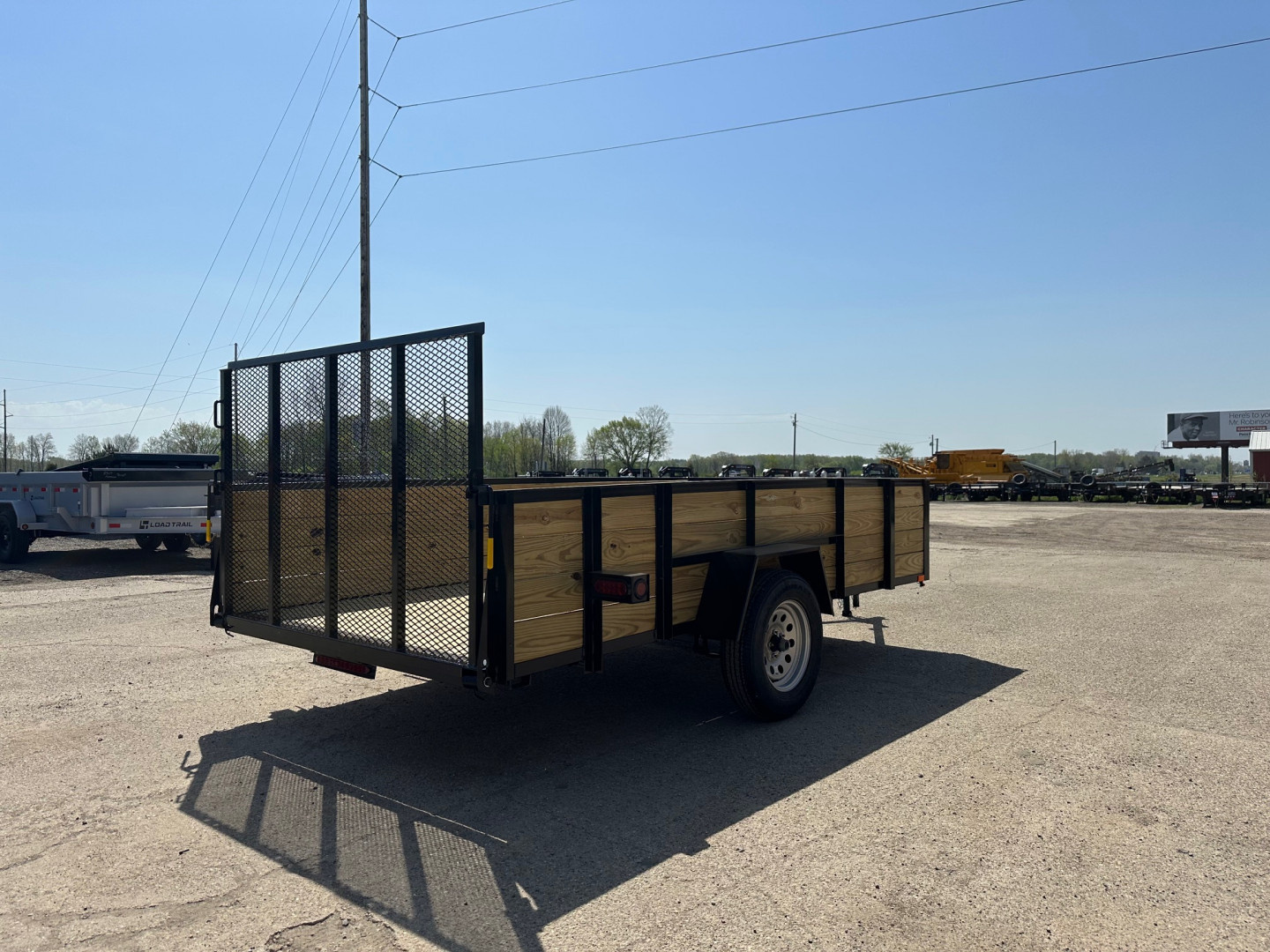 New 2026 AMO 76x12 Wood Side 3K Utility Trailer