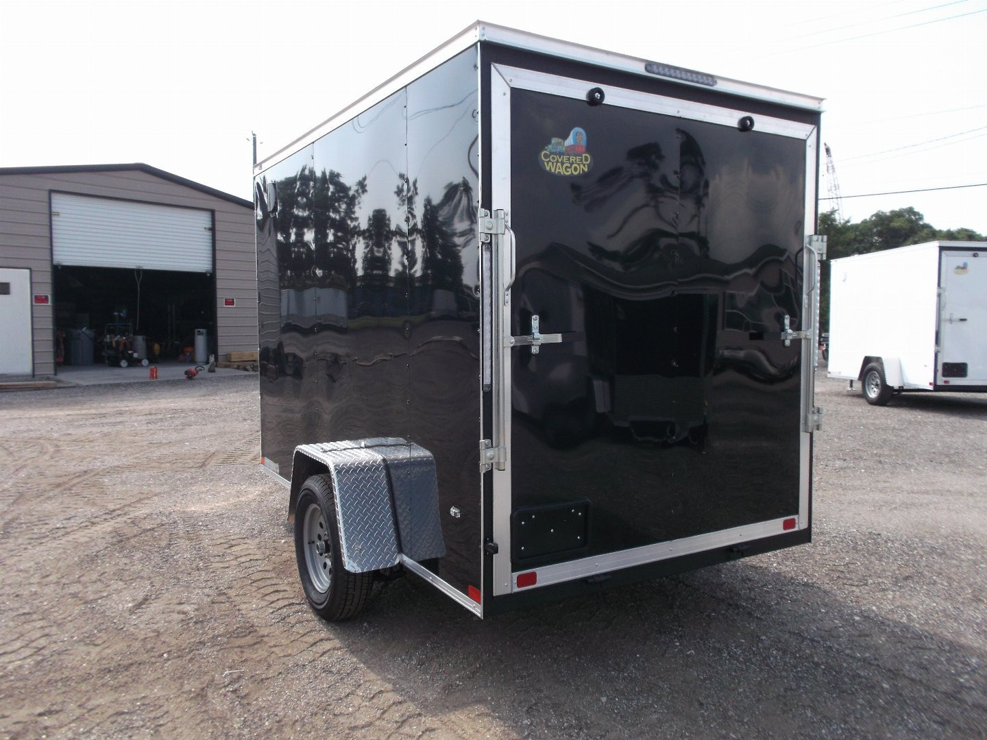New 2026 Covered Wagon Trailers 6x10 Cargo / Enclosed Trailer / 6'6" Interior Height / Extra Wide Ramp Gate / RV Side Door /.030 Black Semi-Screwless Exterior