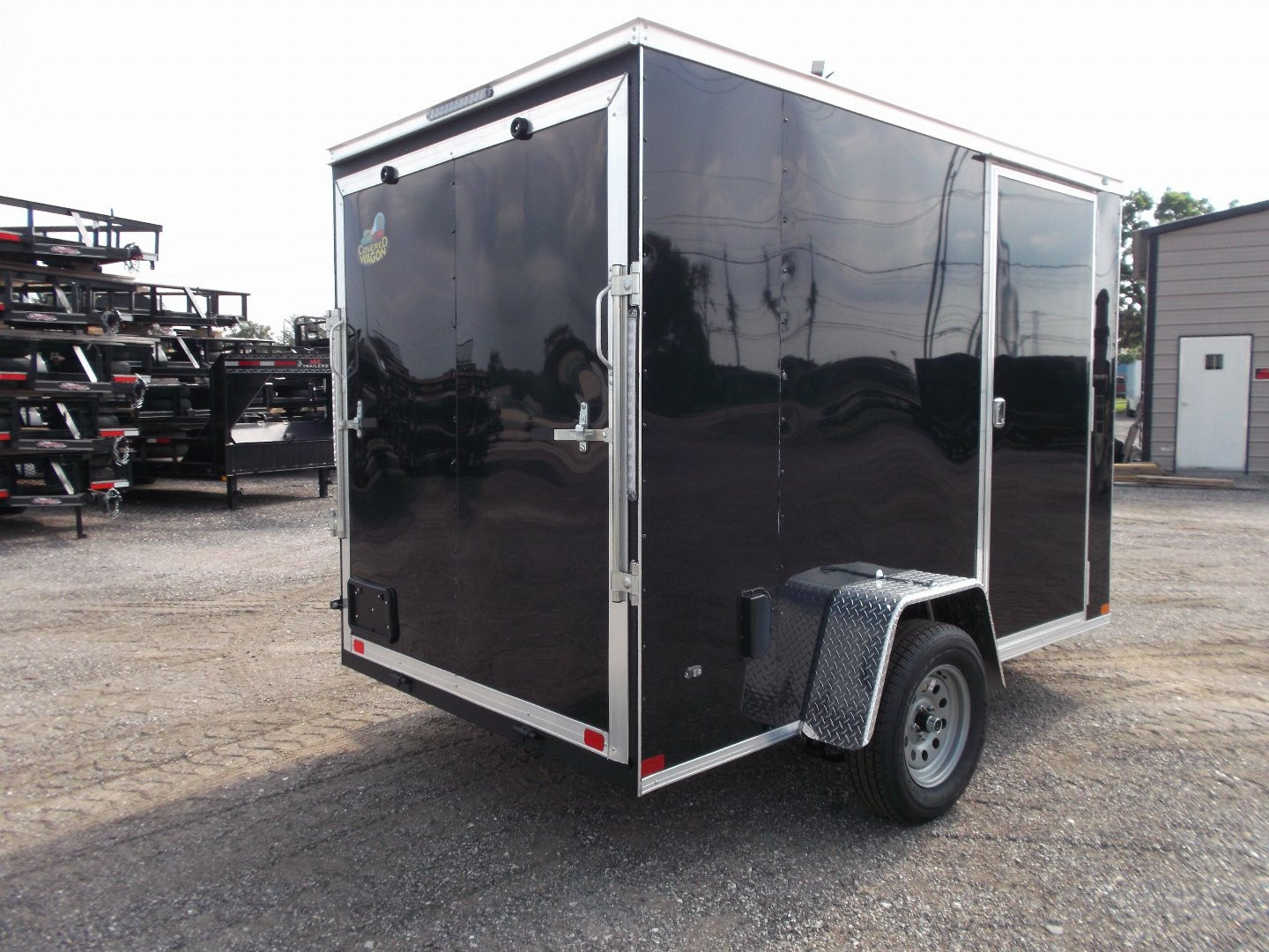 New 2026 Covered Wagon Trailers 6x10 Cargo / Enclosed Trailer / 6'6" Interior Height / Extra Wide Ramp Gate / RV Side Door /.030 Black Semi-Screwless Exterior