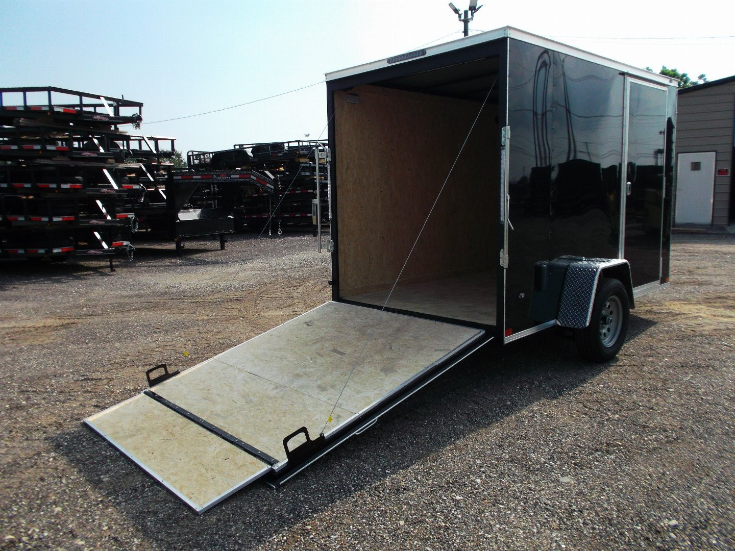 New 2026 Covered Wagon Trailers 6x10 Cargo / Enclosed Trailer / 6'6" Interior Height / Extra Wide Ramp Gate / RV Side Door /.030 Black Semi-Screwless Exterior
