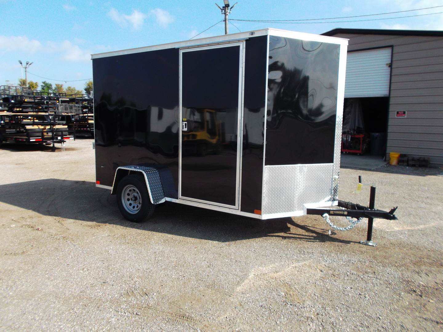 New 2026 Covered Wagon Trailers 6x10 Cargo / Enclosed Trailer / 6'6" Interior Height / Extra Wide Ramp Gate / RV Side Door /.030 Black Semi-Screwless Exterior