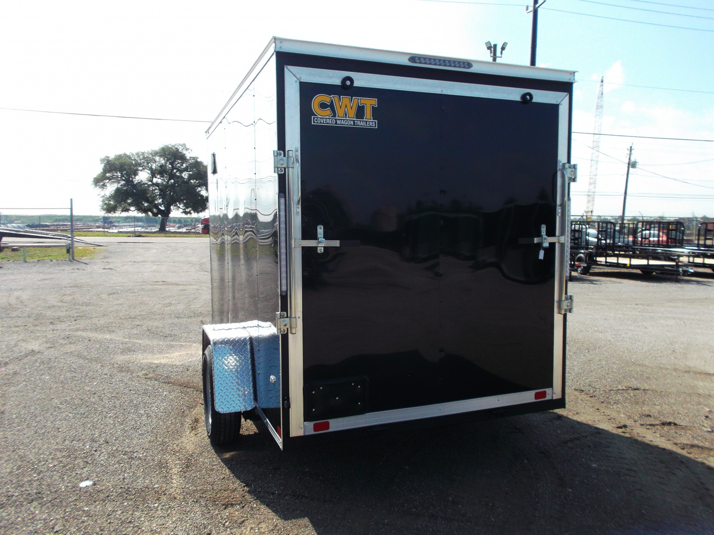 New 2026 Covered Wagon Trailers 6x10 Cargo / Enclosed Trailer / 6'6" Interior Height / Extra Wide Ramp Gate / RV Side Door /.030 Black Semi-Screwless Exterior