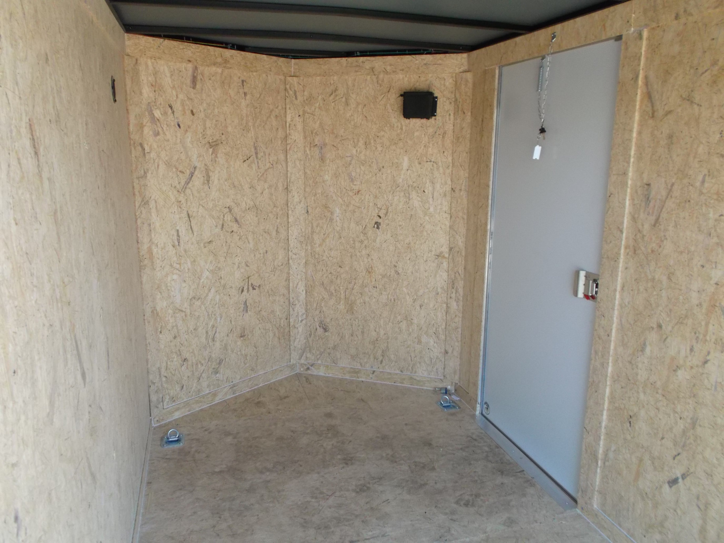 New 2026 Covered Wagon Trailers 6x10 Cargo / Enclosed Trailer / 6'6" Interior Height / Extra Wide Ramp Gate / RV Side Door /.030 Black Semi-Screwless Exterior