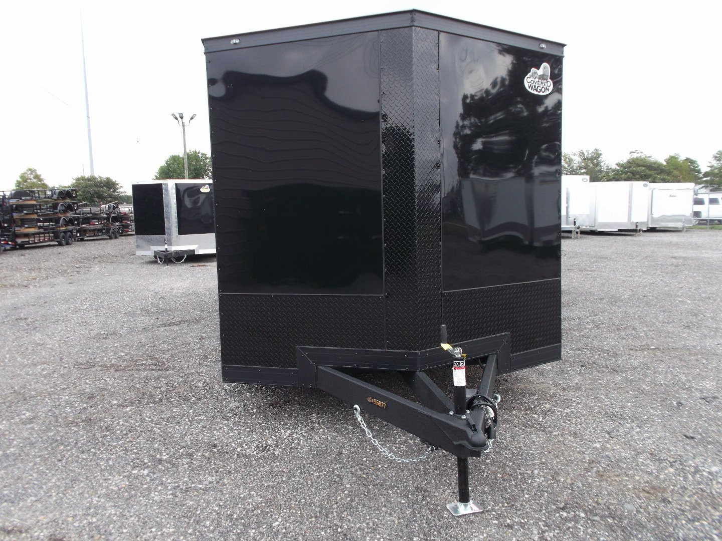 New 2026 Covered Wagon Trailers 8.5x24 Cargo Trailer / Enclosed Cargo Trailer / Enclosed Car Hauler / 7ft Interior / 5200# Axles / Extra Wide Ramp Door / 48" RV Side Door / Bed Lined RV Step / .030 Black Semi-Screwless Exterior / Black Out Package