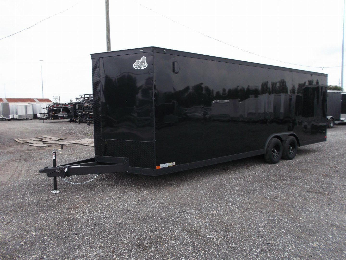 New 2026 Covered Wagon Trailers 8.5x24 Cargo Trailer / Enclosed Cargo Trailer / Enclosed Car Hauler / 7ft Interior / 5200# Axles / Extra Wide Ramp Door / 48" RV Side Door / Bed Lined RV Step / .030 Black Semi-Screwless Exterior / Black Out Package