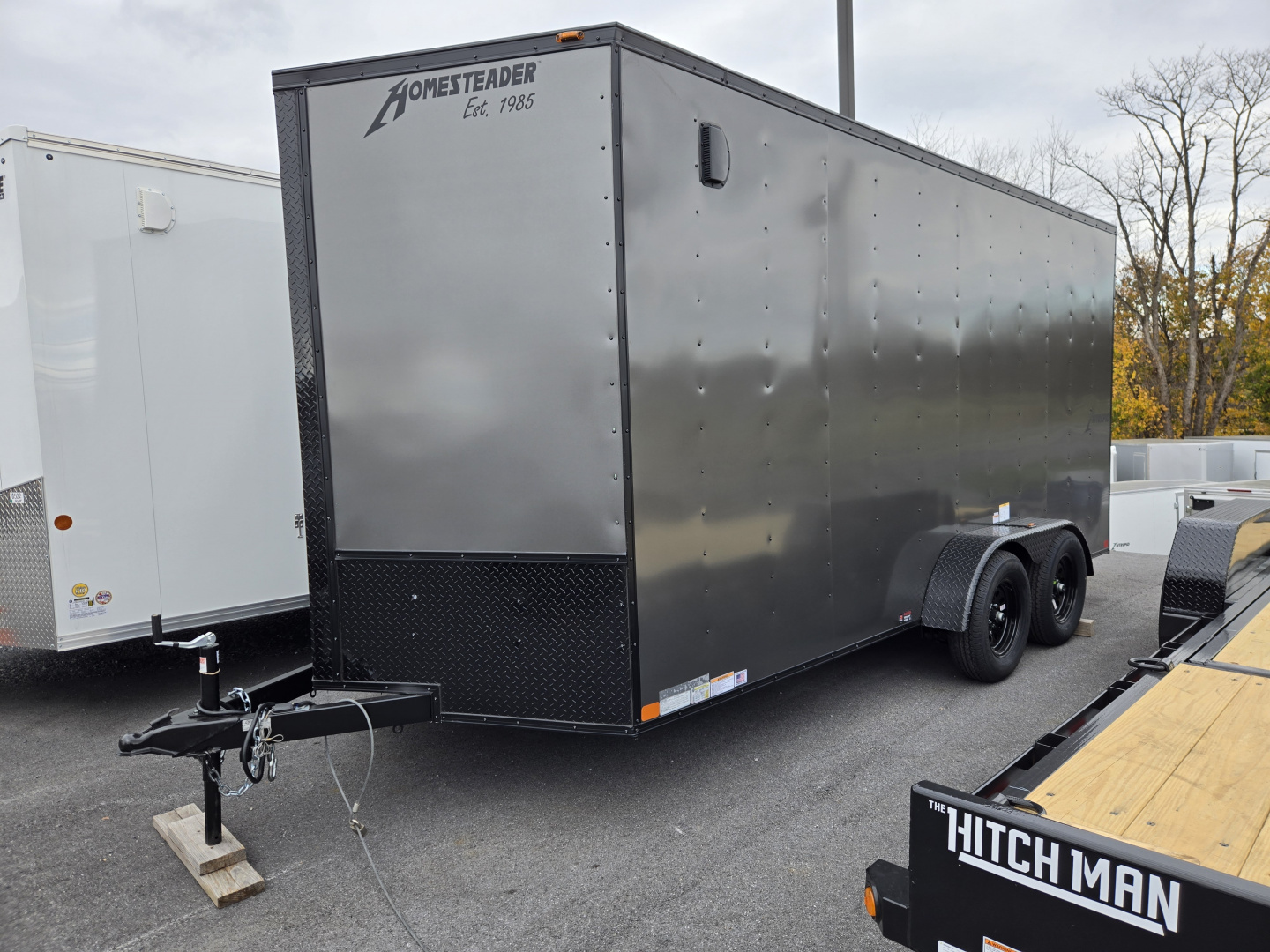 New 7 x 16 Homesteader Intrepid V-Nose Cargo Trailer, 7k GVWR ***6" Extra Height, Black Out Package, Ramp Door, Tie Downs