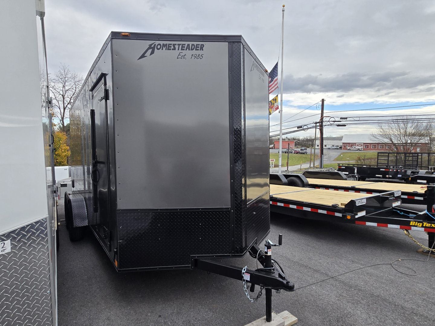 New 7 x 16 Homesteader Intrepid V-Nose Cargo Trailer, 7k GVWR ***6" Extra Height, Black Out Package, Ramp Door, Tie Downs