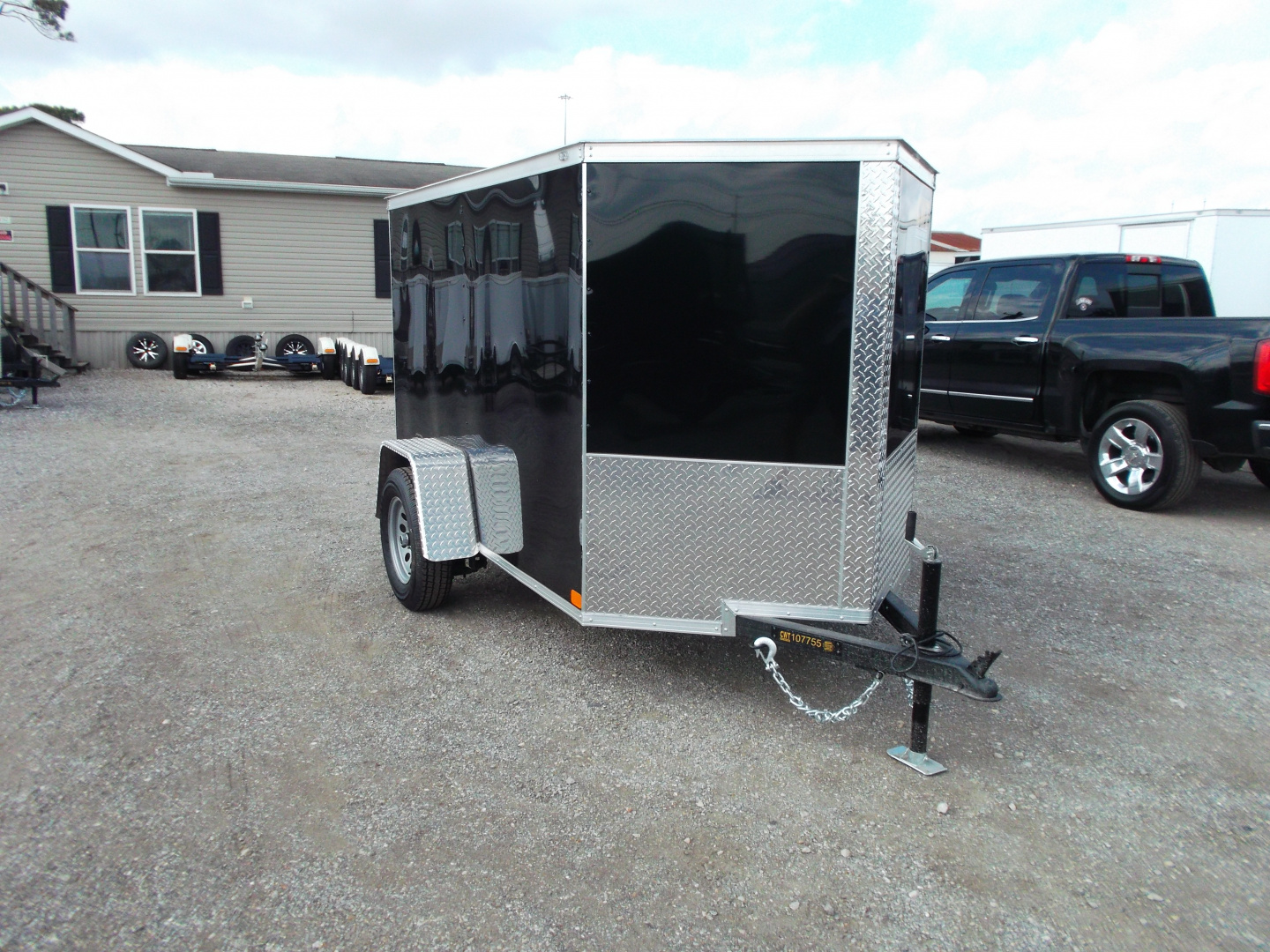 New 2026 Covered Wagon Trailers 5x8 Single Axle Cargo Trailer / Enclosed Trailer / Ramp / LED's / .030 Black Semi-Screwless Exterior / Bed Lined Tongue and Frame