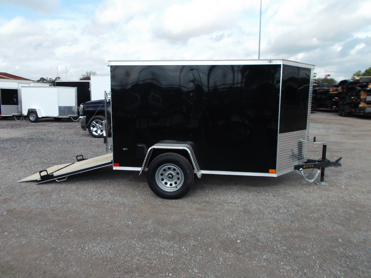 New 2026 Covered Wagon Trailers 5x8 Single Axle Cargo Trailer / Enclosed Trailer / Ramp / LED's / .030 Black Semi-Screwless Exterior / Bed Lined Tongue and Frame