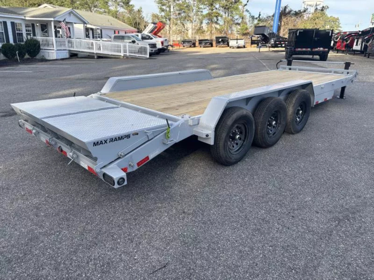 New 2026 Load Trail 83X24 MAX RAMP TRIPLE AXLE 21K GVWR Equipment Trailer