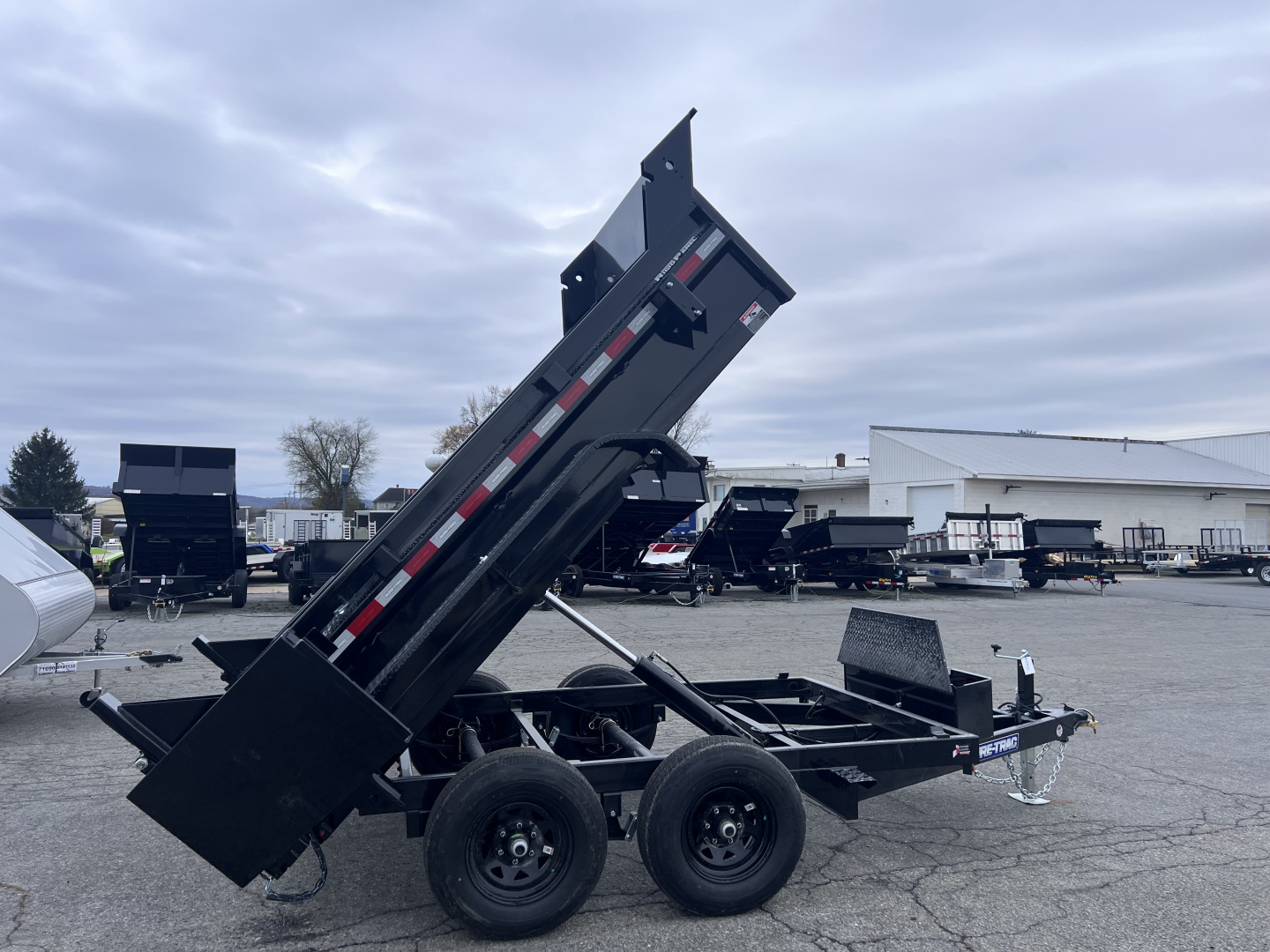 New 2026 Sure-Trac 6x10 10K Low Pro Dump Trailer