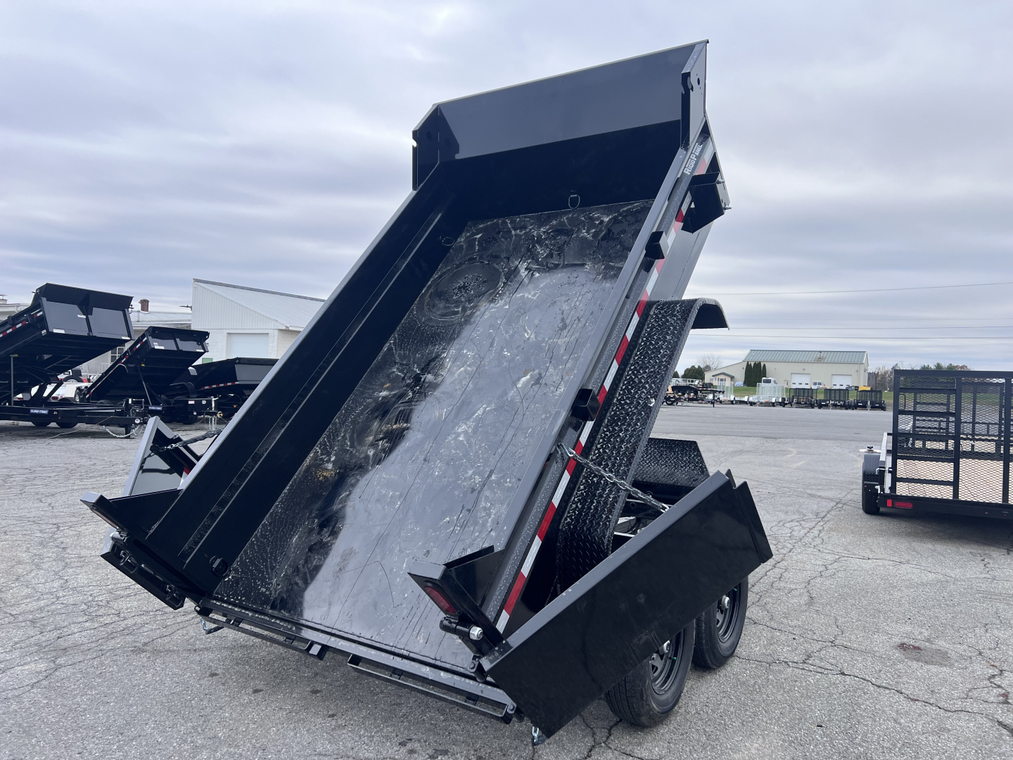 New 2026 Sure-Trac 6x10 10K Low Pro Dump Trailer