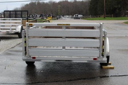 New 2026 H & H 5' 5" x 10' Aluminum Wood Side Utility Trailer - BiFold Ramp - 2990# GVW