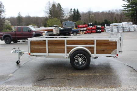 New 2026 H & H 5' 5" x 10' Aluminum Wood Side Utility Trailer - BiFold Ramp - 2990# GVW