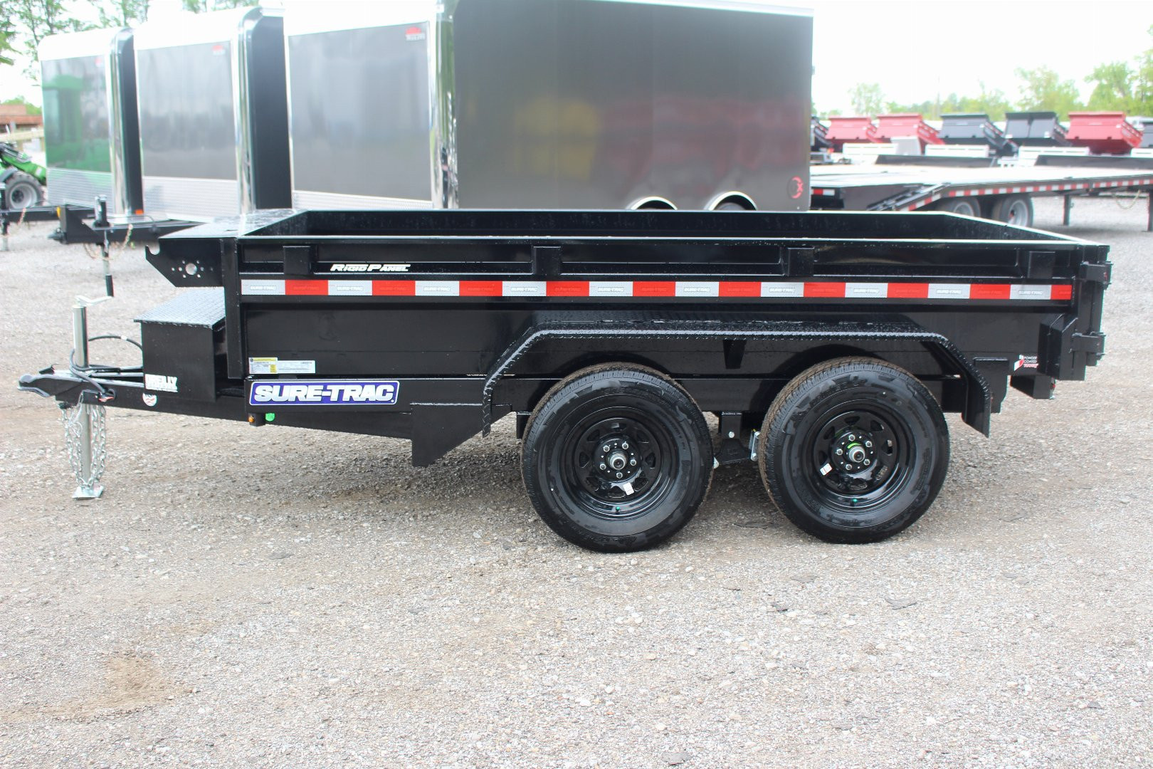 New 2026 Sure-Trac 5' x 10' Low Profile Homeowner Dump Trailer 7K TA - Single Ram (NO RAMPS)