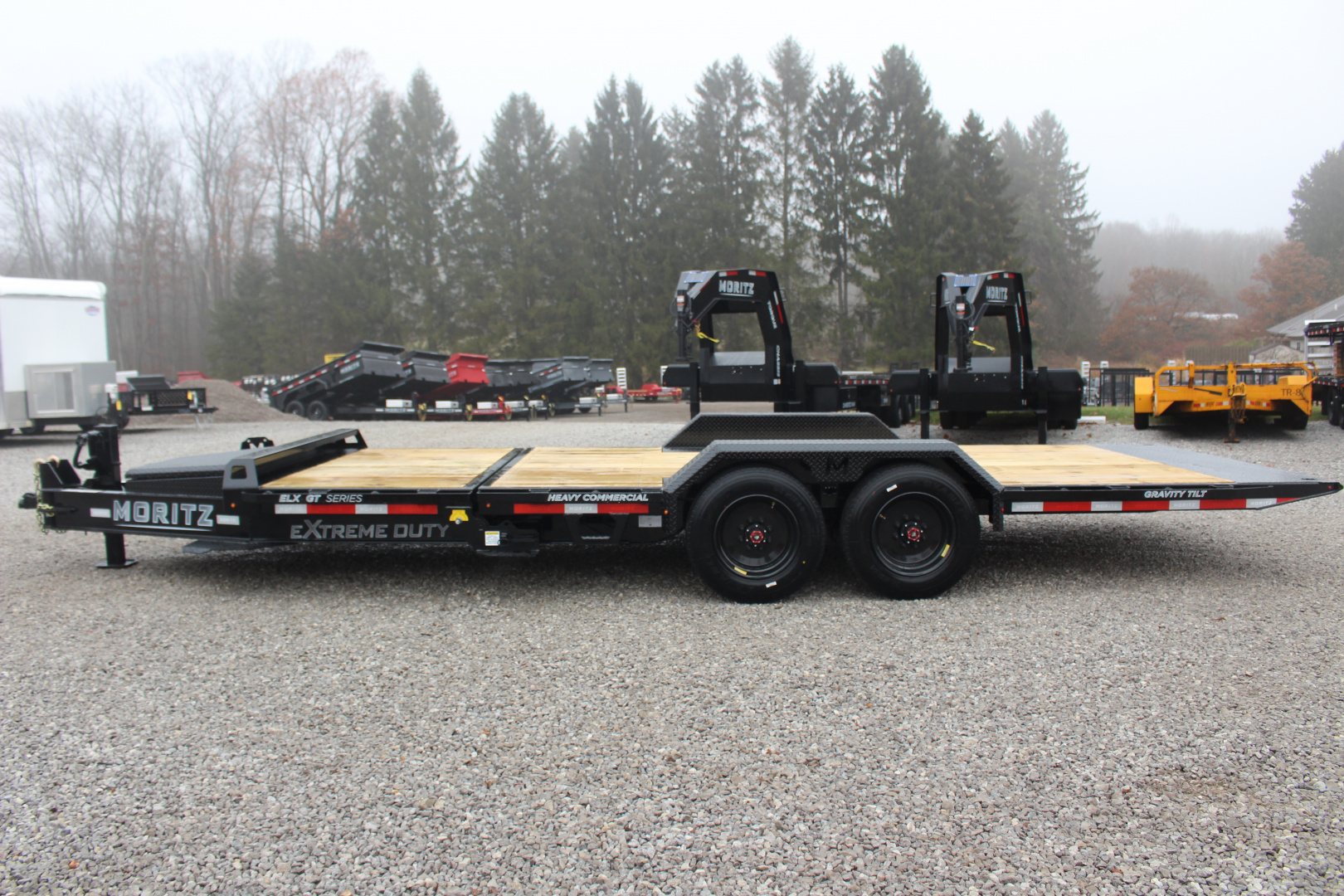 New 2026 Moritz 7' x 16' + 4' Low Pro - Gravity Tilt - Tilt Trailer - 22900# GVW