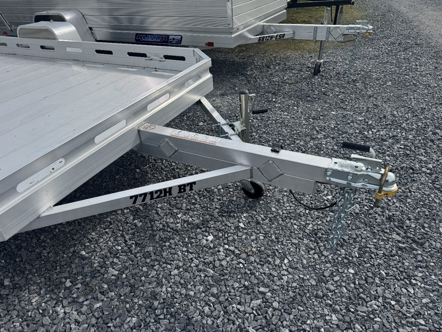 New 2026 Aluma 7712H-S-BT Bifold Gate Utility Trailer