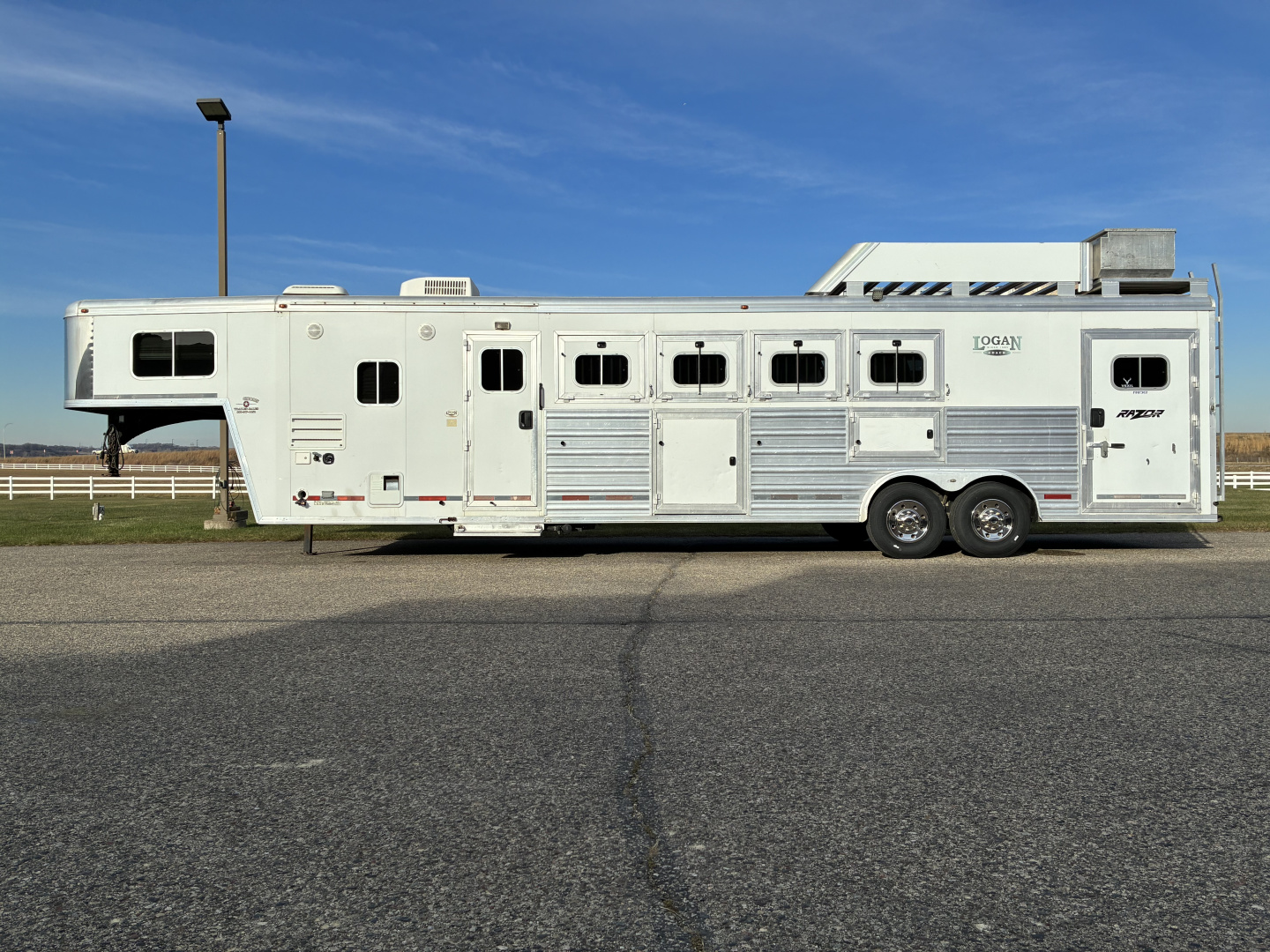 Used 2013 Logan Coach 4H LQ Horse Trailer