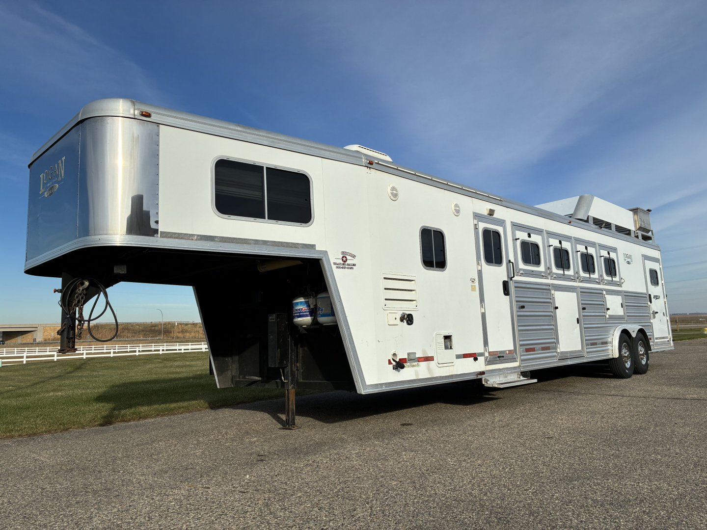 Used 2013 Logan Coach 4H LQ Horse Trailer
