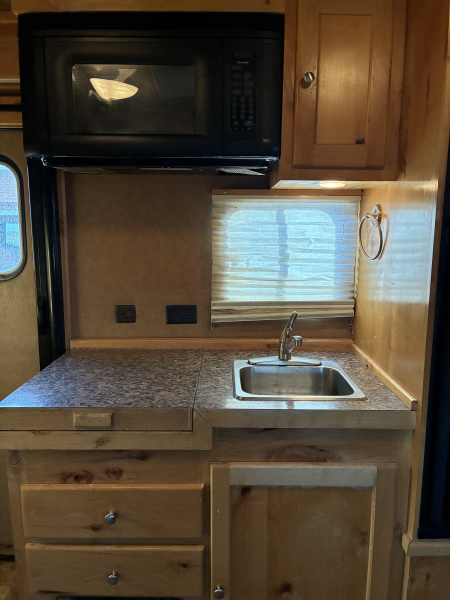 Used 2013 Logan Coach 4H LQ Horse Trailer