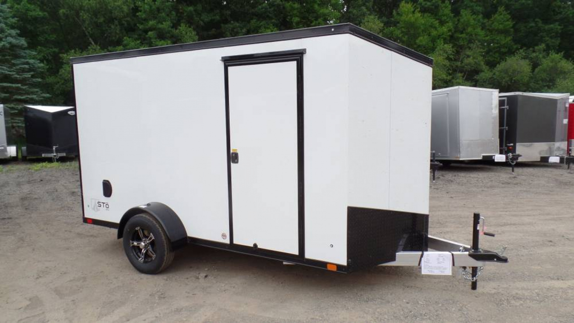 New ATC Aluminum Enclosed Cargo Trailer 6X12, 66 interior height, White with Black Trim Pkg., Ramp Door, SALE $7,995.  #231404