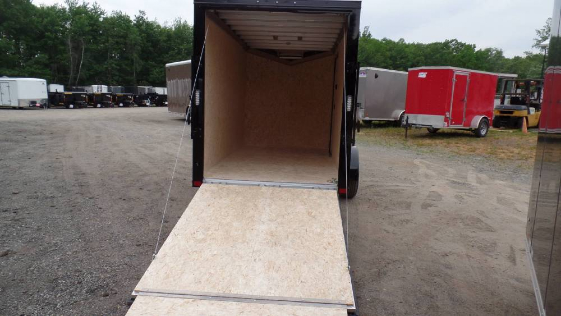 New ATC Aluminum Enclosed Cargo Trailer 6X12, 66 interior height, White with Black Trim Pkg., Ramp Door, SALE $7,995.  #231404