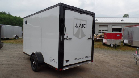 New ATC Aluminum Enclosed Cargo Trailer 6X12, 66 interior height, White with Black Trim Pkg., Ramp Door, SALE $7,995.  #231404