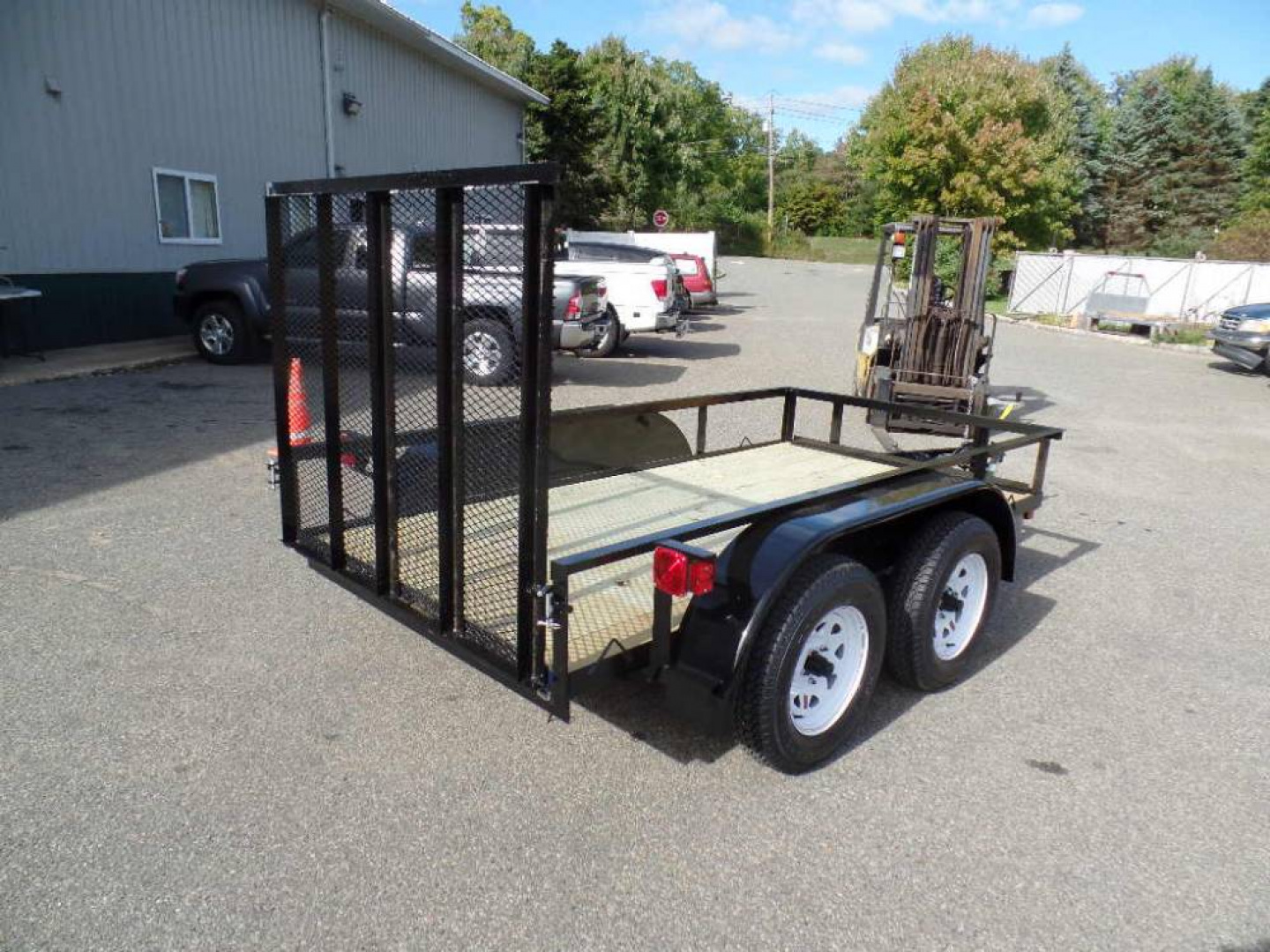 New 5 X 10 , 2 Axle Utility Trailer,  7,000 lb. GVWR.  #012233