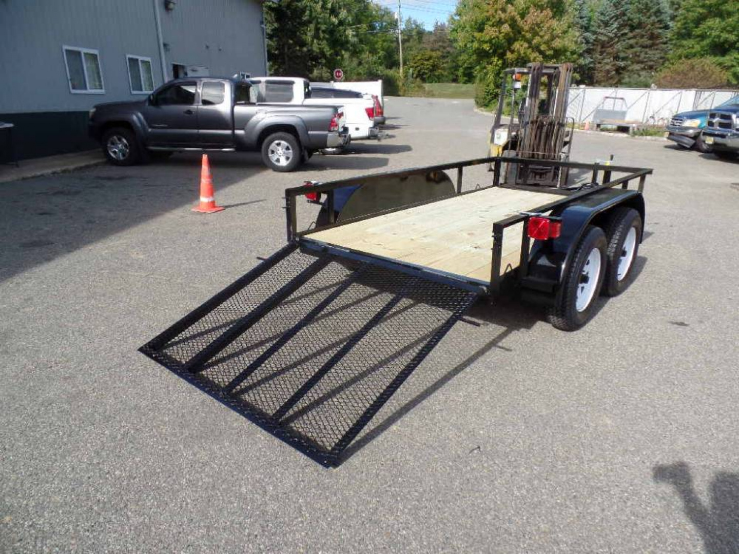 New 5 X 10 , 2 Axle Utility Trailer,  7,000 lb. GVWR.  #012233