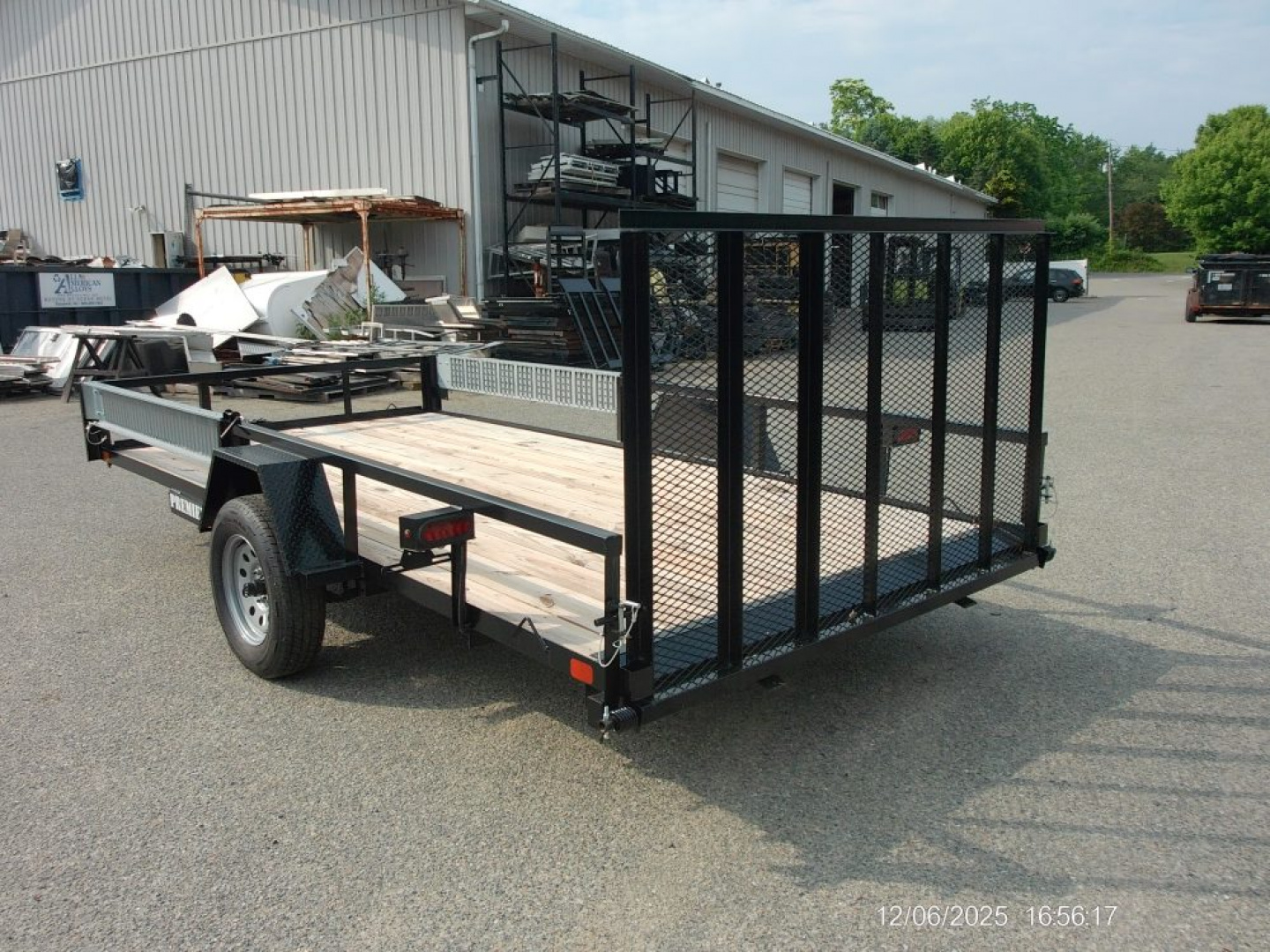 New PREMIER BRAND, 7X14 TWO QUAD/ ATV TRAILER, Side Load Ramps, Rear Ramp with Spring Assist our ID#013537
