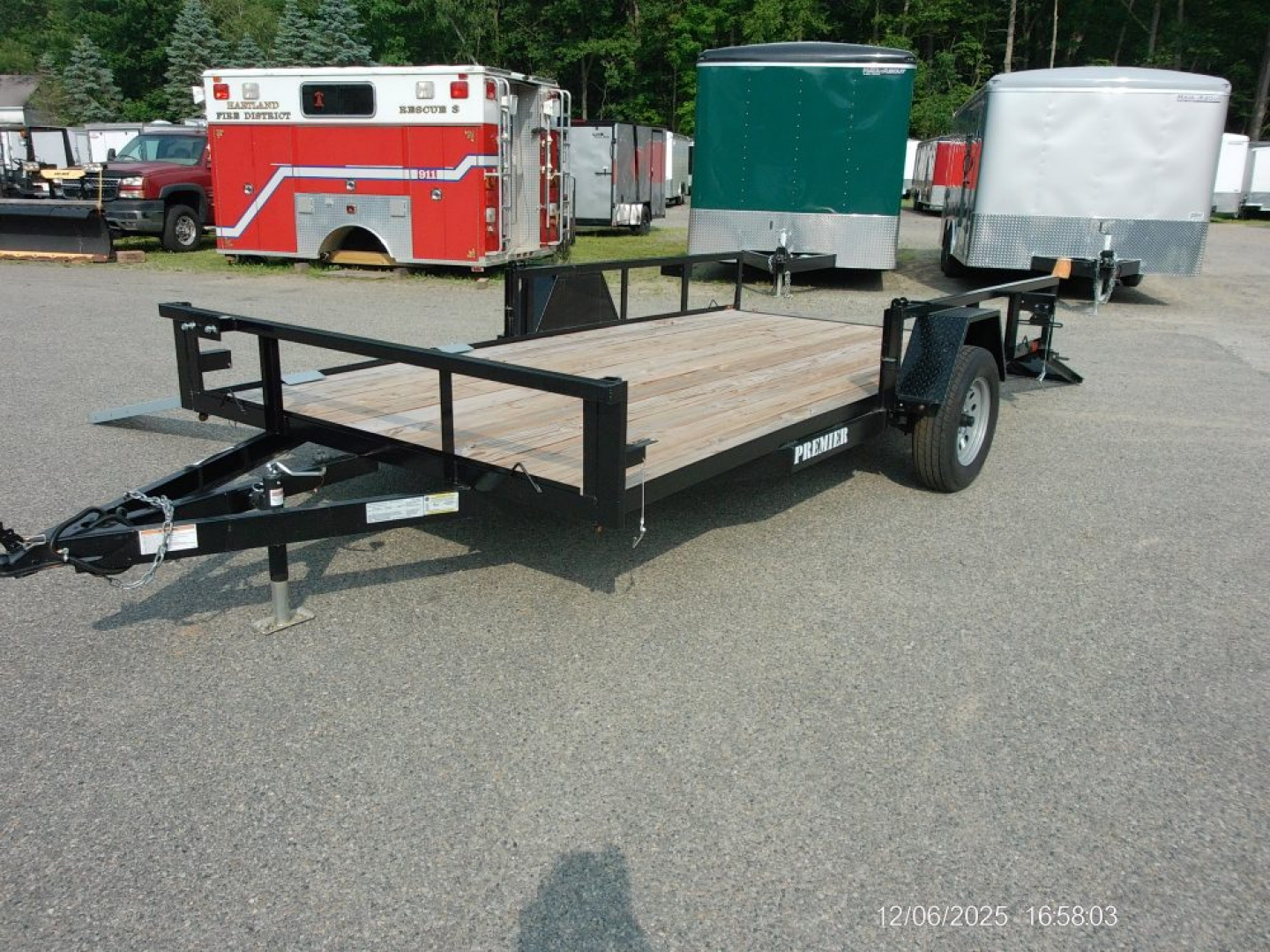 New PREMIER BRAND, 7X14 TWO QUAD/ ATV TRAILER, Side Load Ramps, Rear Ramp with Spring Assist our ID#013537
