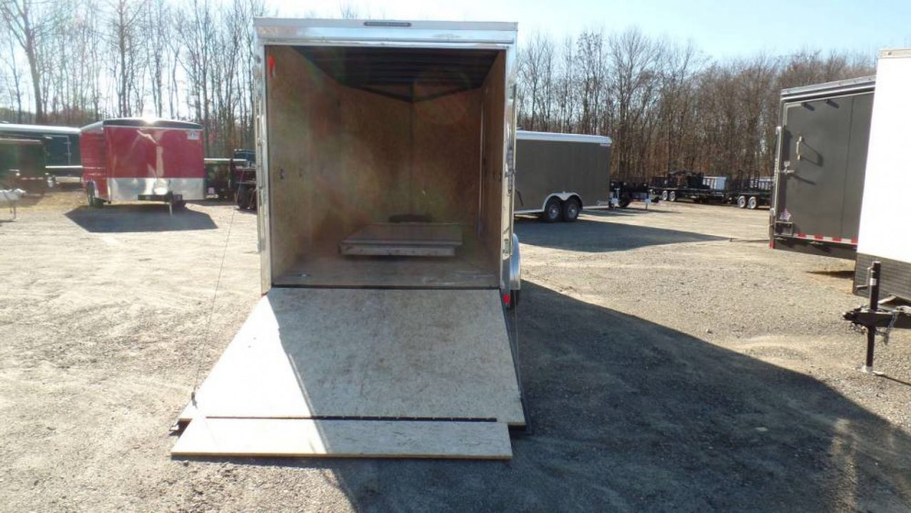 New EXAMPLE / 7X14 Enclosed Cargo Trailer, with UTV upgrade package, 85 interior height, 78 tall at the Ramp Door, NEW Polycore Exterior!