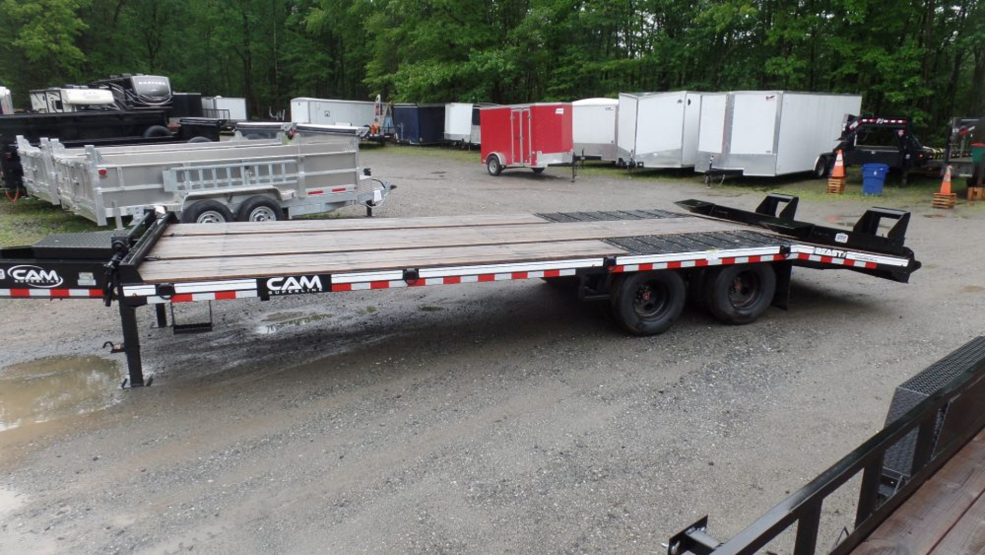 New CAM Superline, 10 Ton Payload Equipment Trailer. / 25,900 lb. GVWR ( No FET) , 20 ft. flat deck plus 5 ft. beavertail, Wood Filled Ramps, Empty Weight 6,450 lbs.  ID#541395