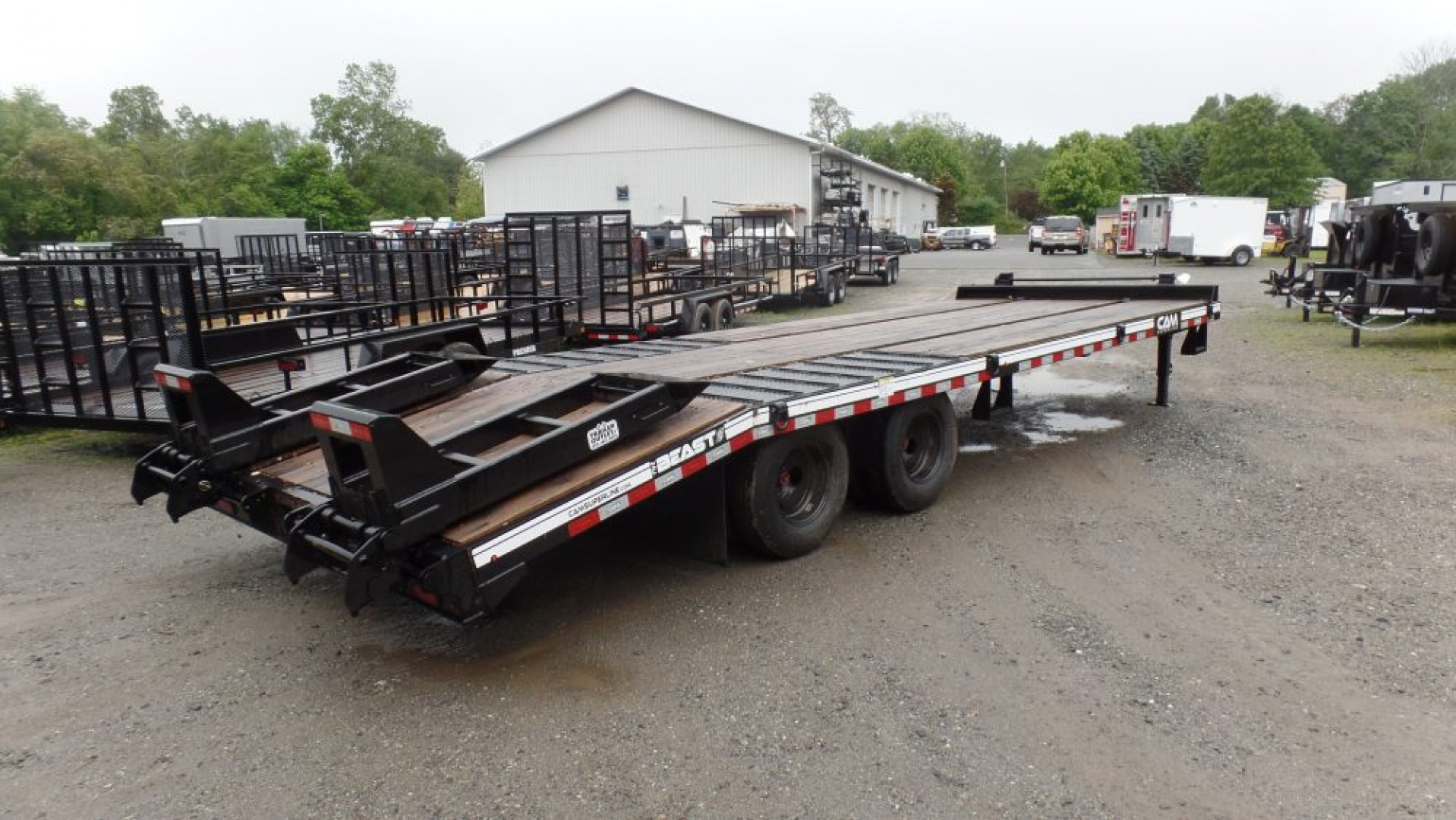 New CAM Superline, 10 Ton Payload Equipment Trailer. / 25,900 lb. GVWR ( No FET) , 20 ft. flat deck plus 5 ft. beavertail, Wood Filled Ramps, Empty Weight 6,450 lbs.  ID#541395