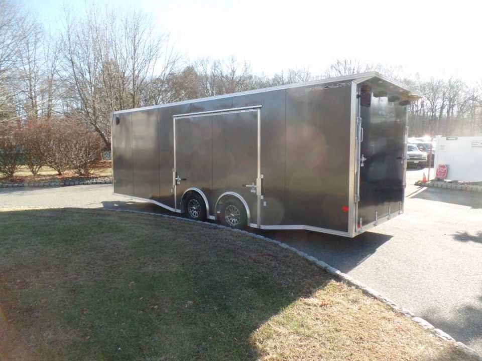 New EXAMPLE / 8.5X24 Alcom Stealth Enclosed Car Trailer with Big Escape Door, Aluminum Frame, Torflex Axles, Finished Interior. ID# 146971