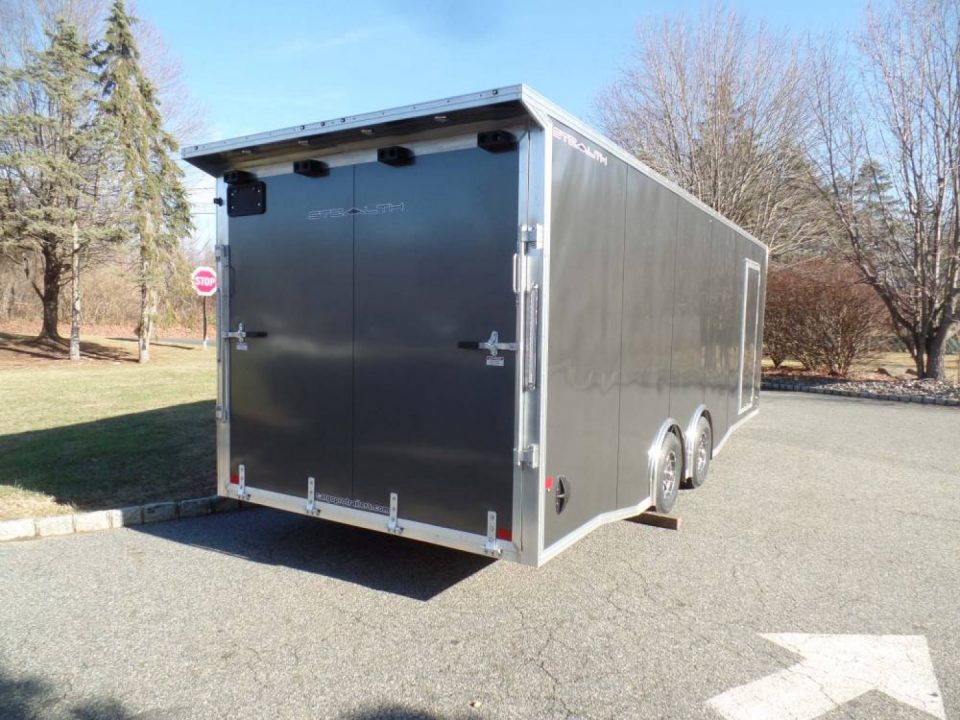 New EXAMPLE / 8.5X24 Alcom Stealth Enclosed Car Trailer with Big Escape Door, Aluminum Frame, Torflex Axles, Finished Interior. ID# 146971