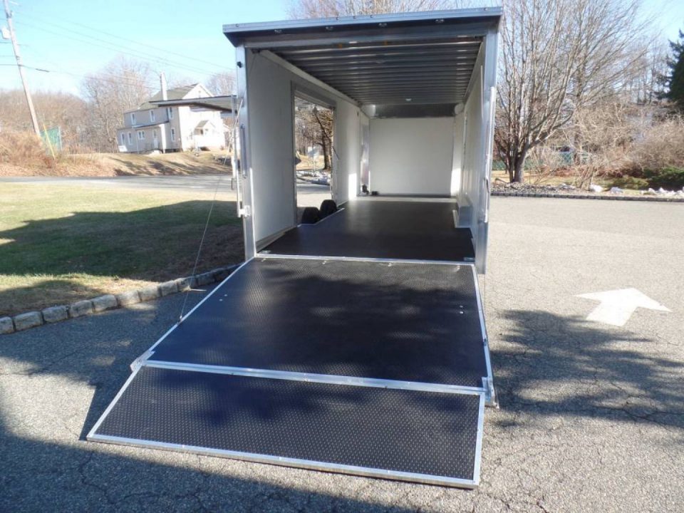 New EXAMPLE / 8.5X24 Alcom Stealth Enclosed Car Trailer with Big Escape Door, Aluminum Frame, Torflex Axles, Finished Interior. ID# 146971