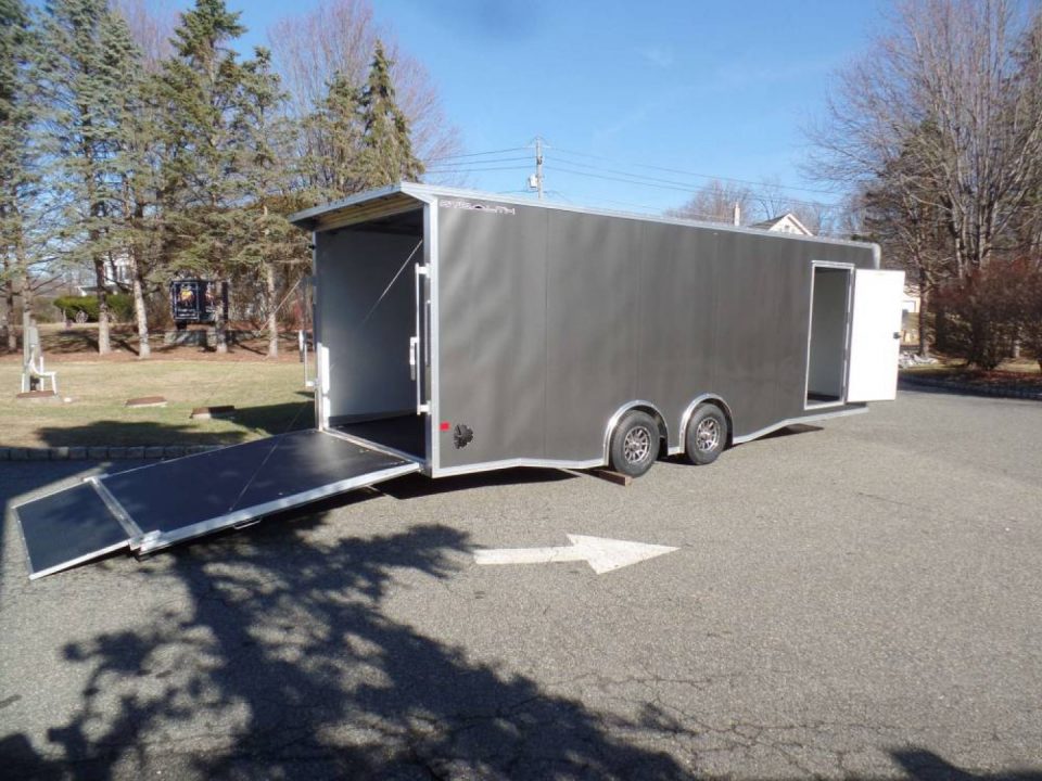 New EXAMPLE / 8.5X24 Alcom Stealth Enclosed Car Trailer with Big Escape Door, Aluminum Frame, Torflex Axles, Finished Interior. ID# 146971