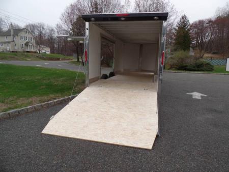 New EXAMPLE / NITRO 8.5X24 Enclosed Car Trailer, NEW .085 Polycore Exterior ( no ripples ), Big Escape Door, Torflex Axles, Aluminum Frame! our ID# 008547