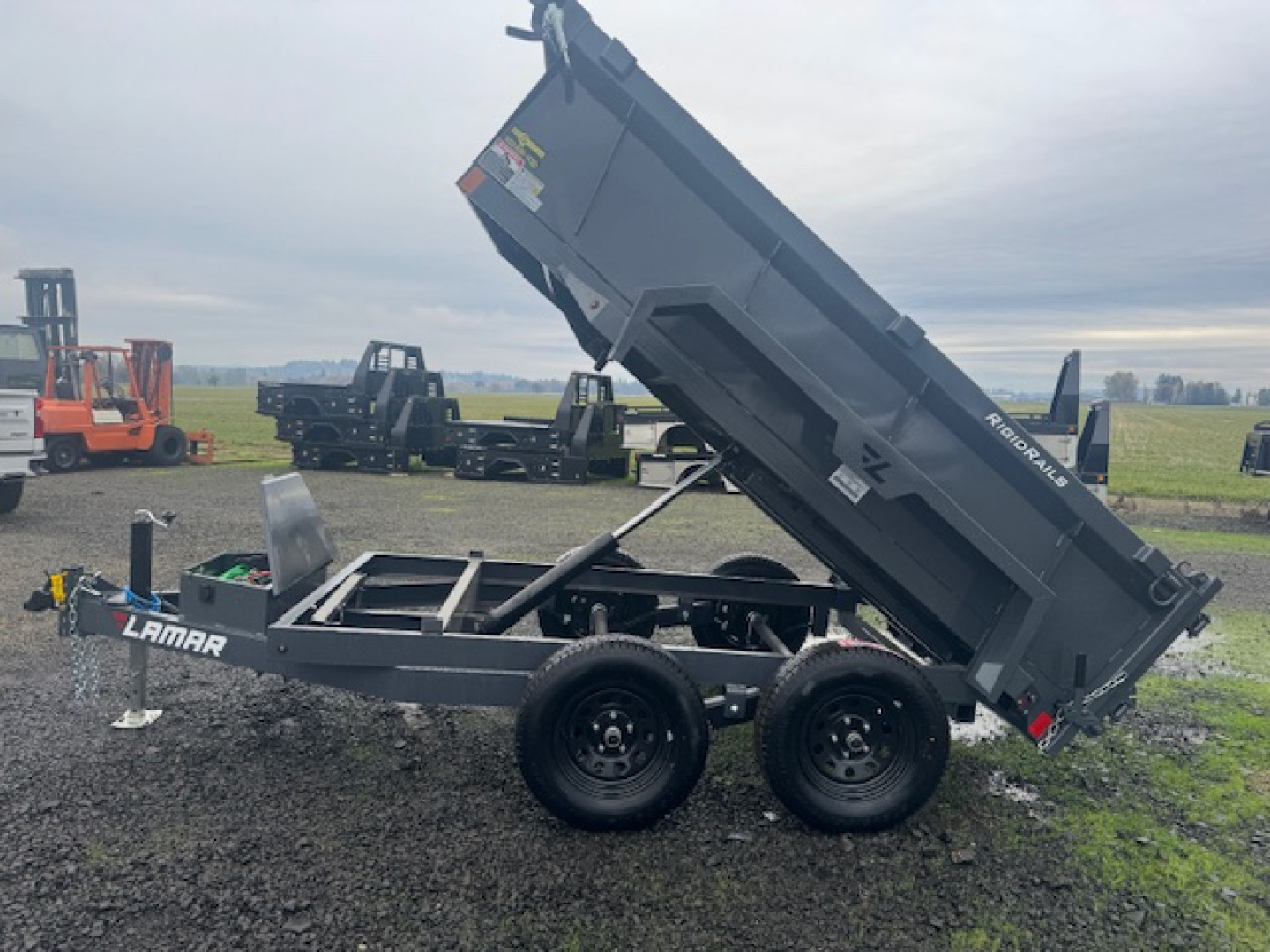 New 2026 LAMAR TRAILERS 60" x 10' DS23 Tandem Axle 7K Dump Trailer