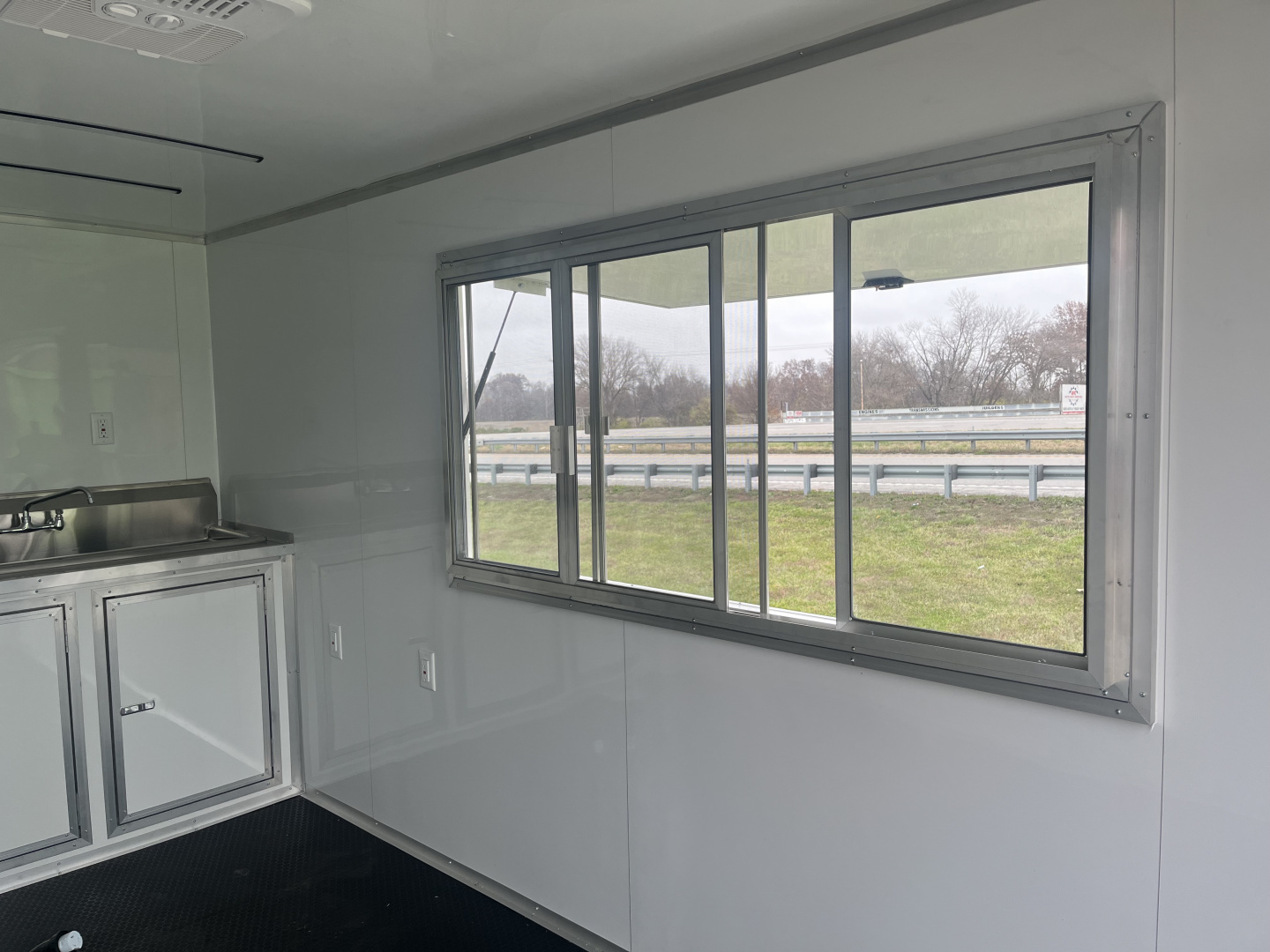 New 2026 Steel Pines Cargo 7x14 TA , 7' interior height, 35k axles, .080 polycore Concession