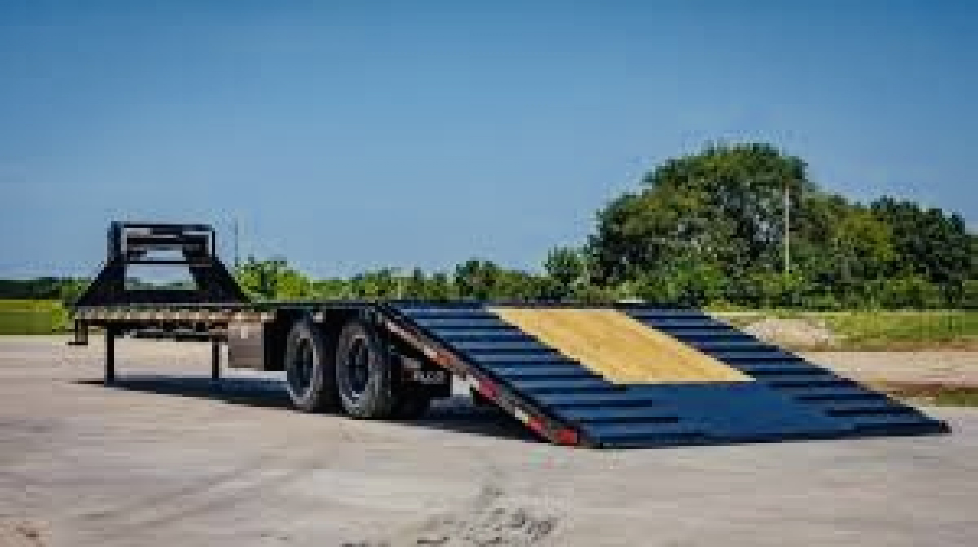 New 2026 Delco Trailers 32FT Delco FH-25.9K Low Pro Dual Tandem Hydraulic Dovetail Flatbed Trailer