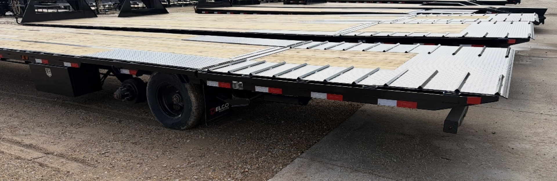 New 2026 Delco Trailers 32FT Delco FH-25.9K Low Pro Dual Tandem Hydraulic Dovetail Flatbed Trailer