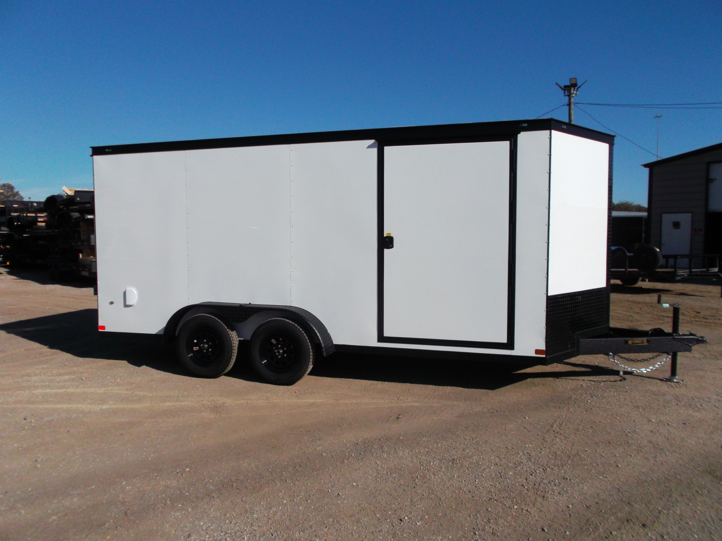 New 2026 Covered Wagon Trailers 7x16 Cargo Trailer / Enclosed Trailer / 6'6" Interior / Extra Wide Ramp / 48" RV Door / .030 White Semi-Screwless Exterior / Black Out Package Cargo / Enclosed Trailer