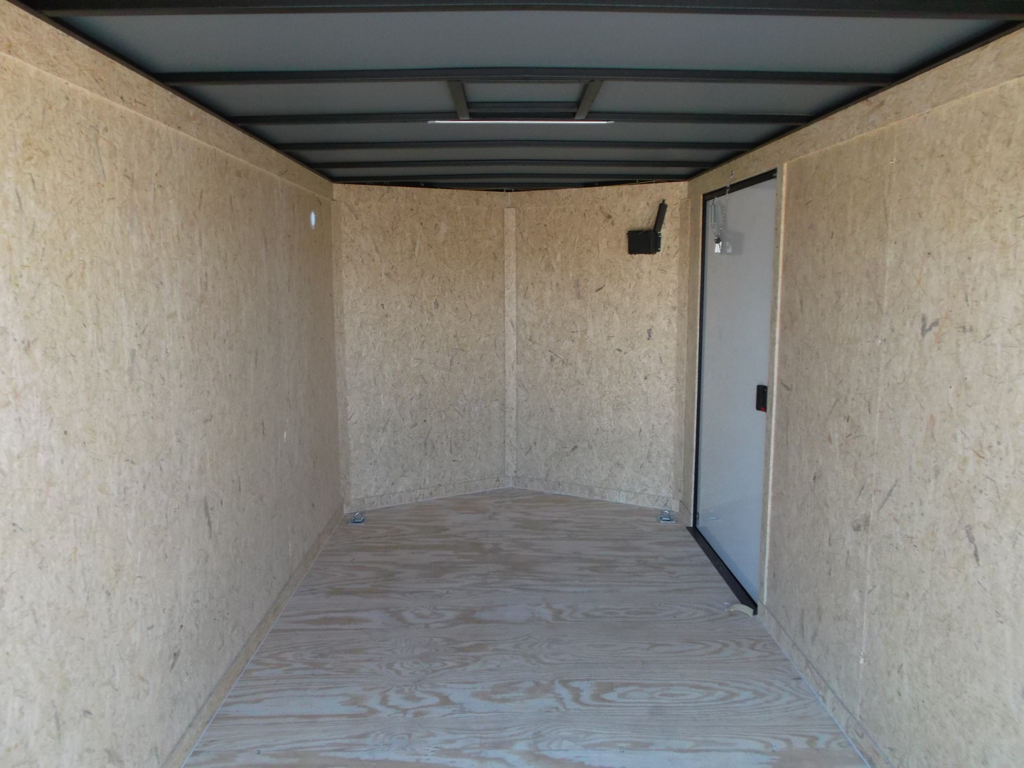 New 2026 Covered Wagon Trailers 7x16 Cargo Trailer / Enclosed Trailer / 6'6" Interior / Extra Wide Ramp / 48" RV Door / .030 White Semi-Screwless Exterior / Black Out Package Cargo / Enclosed Trailer