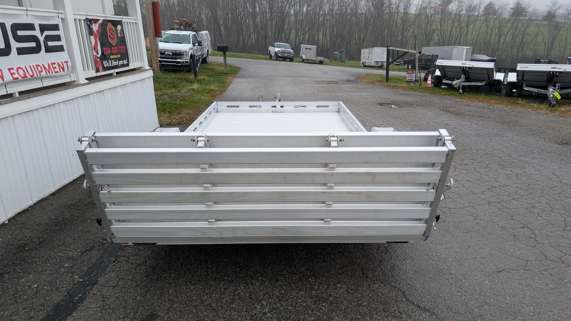 New 2026 Aluma 6'6" x 24' Tandem Utility Trailer w/ Bi-Fold Gate