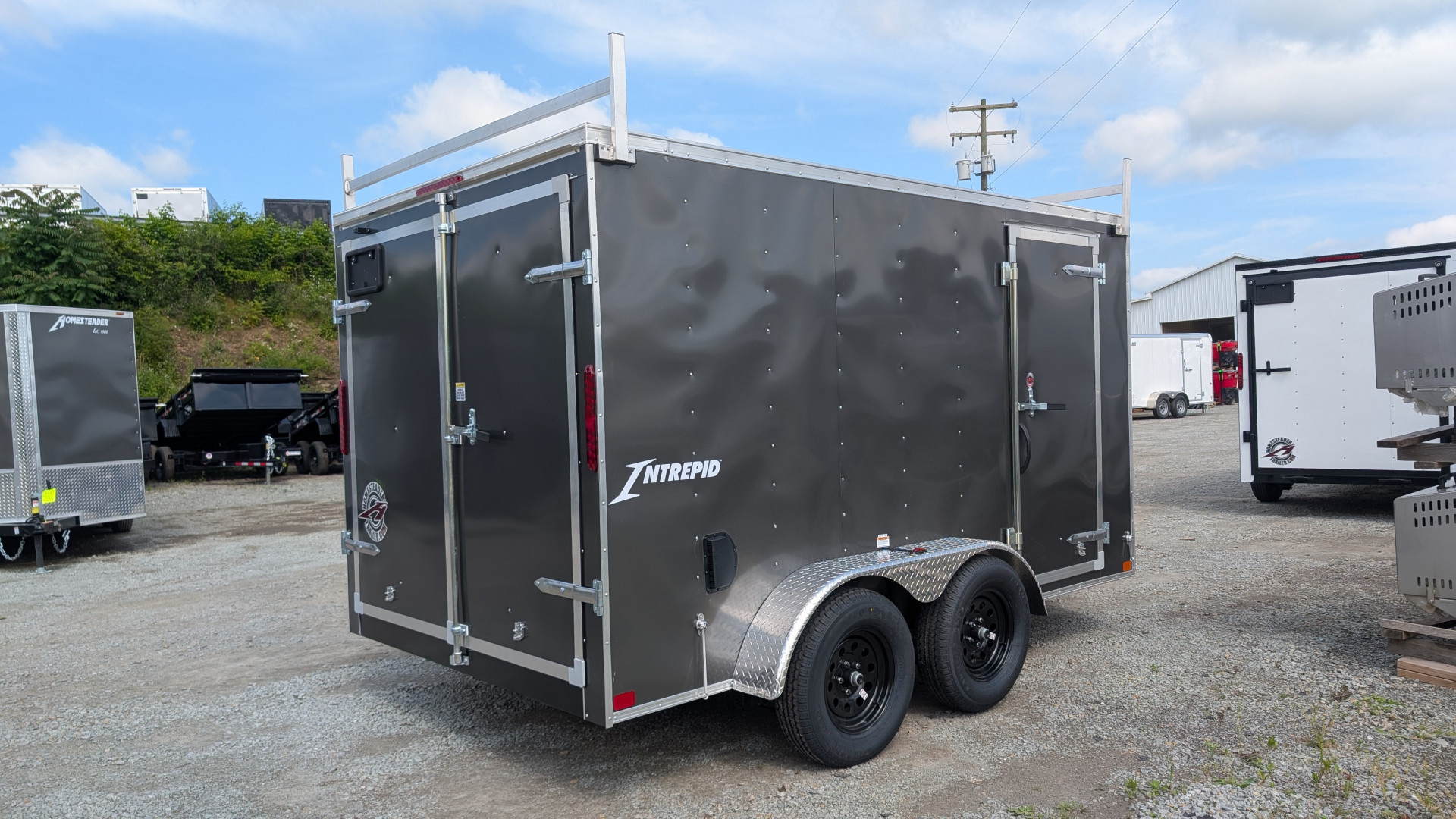 New 2026 Homesteader 7x12 Tandem Intrepid V-Nose Contractor Trailer w/ Barn Doors