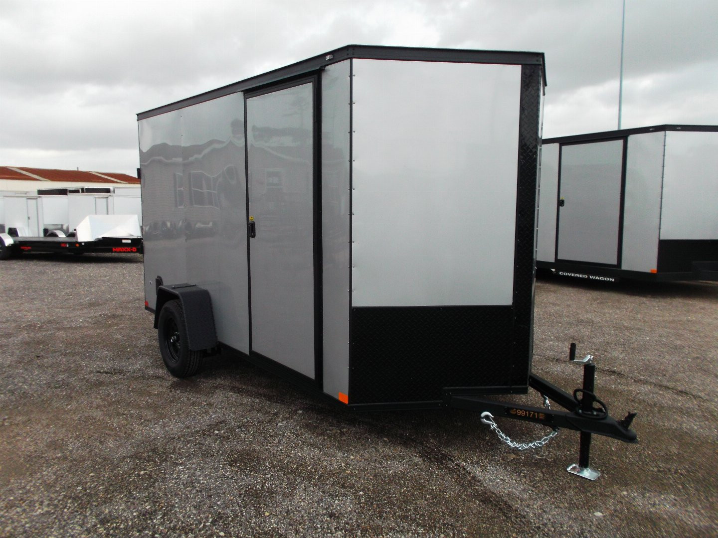 New 2026 Covered Wagon Trailers 6x10 Cargo / Enclosed Trailer / 6'6" Interior / Extra Wide Ramp / RV Side Door / LEDs / .030 Silver Semi-Screwless Exterior / Black Out Package